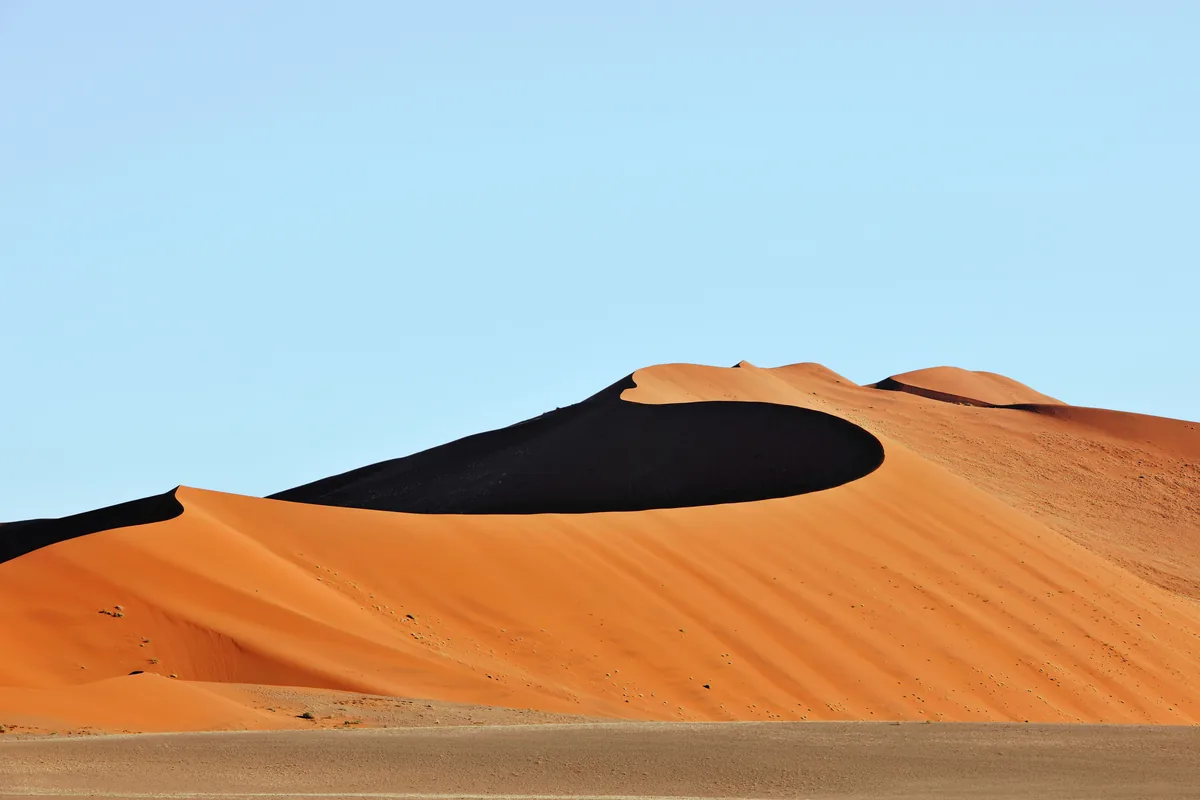 Orange sand dunes of Sossusvlei in the Namib Desert
