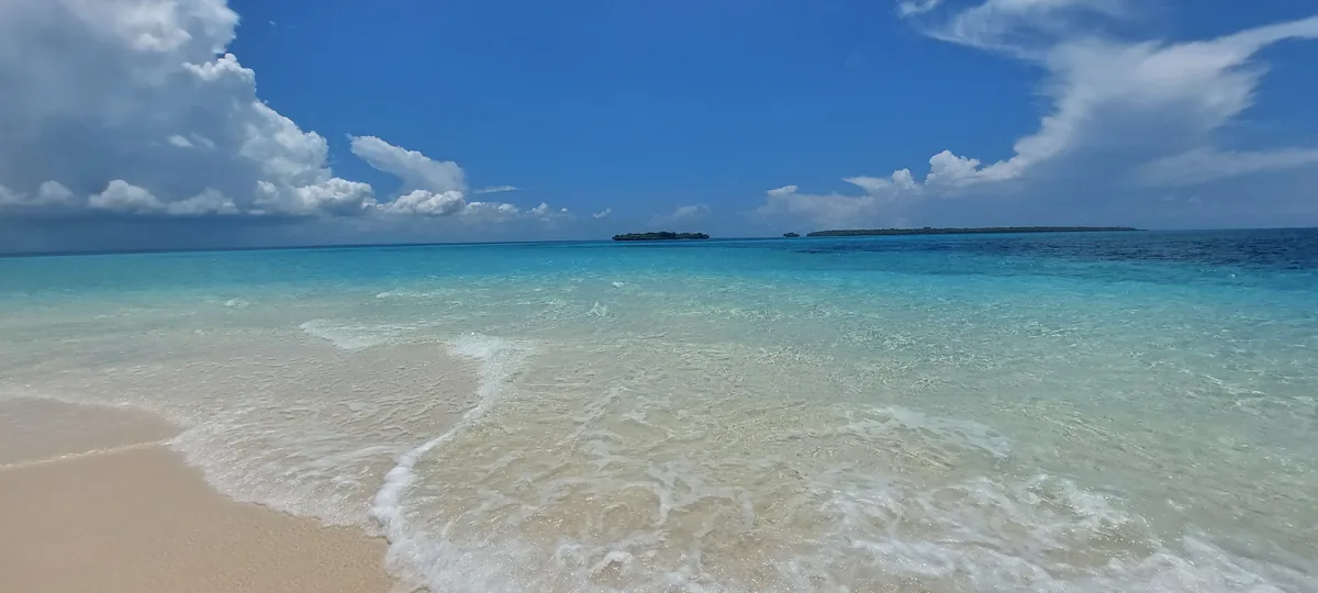 White sand beach and turquoise lagoon at Zanzibar